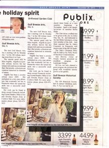 A newspaper article featuring a profile on Gulf Breeze Arts, with a photograph of a woman and promotional listings for Publix products on the right.