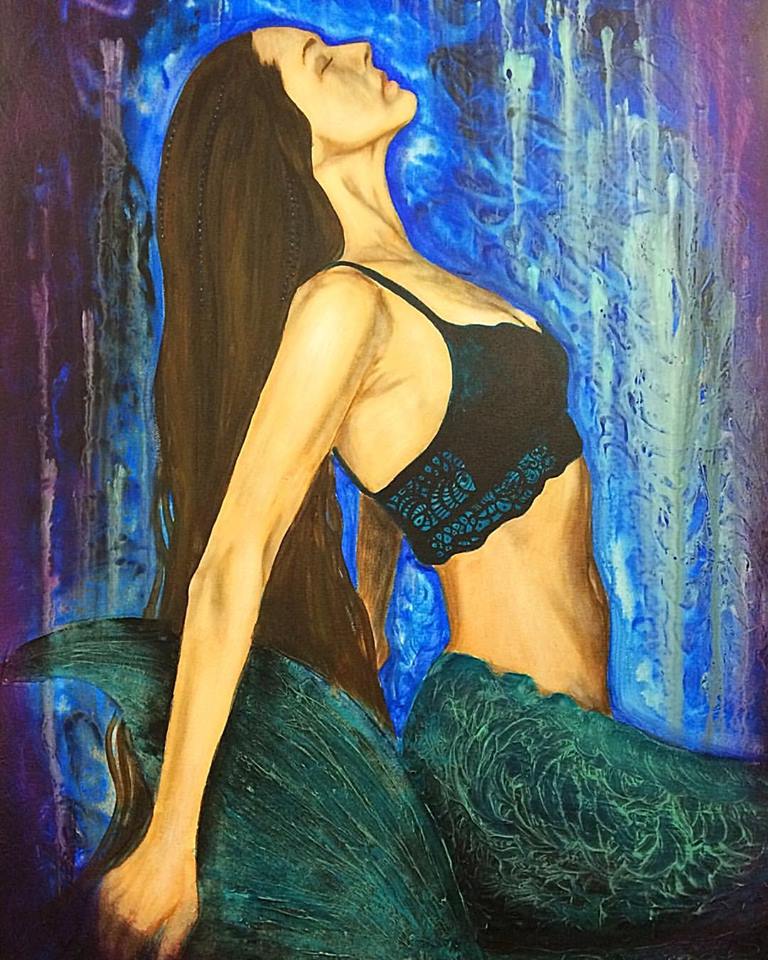 A painting of a woman with long dark hair, gracefully arching her back while wearing a black bra, and displaying a colorful mermaid tail. The background features shades of blue and abstract textures.