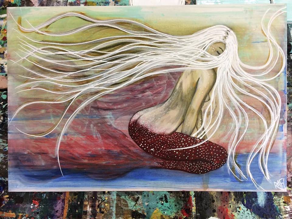 A mermaid with long flowing hair and a red-speckled tail sits gracefully, blending into an abstract background of soft colors.