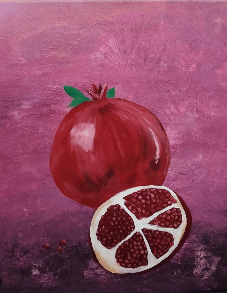 A still life painting of a pomegranate, one whole and one cut in half, showcasing its red seeds against a pink background.