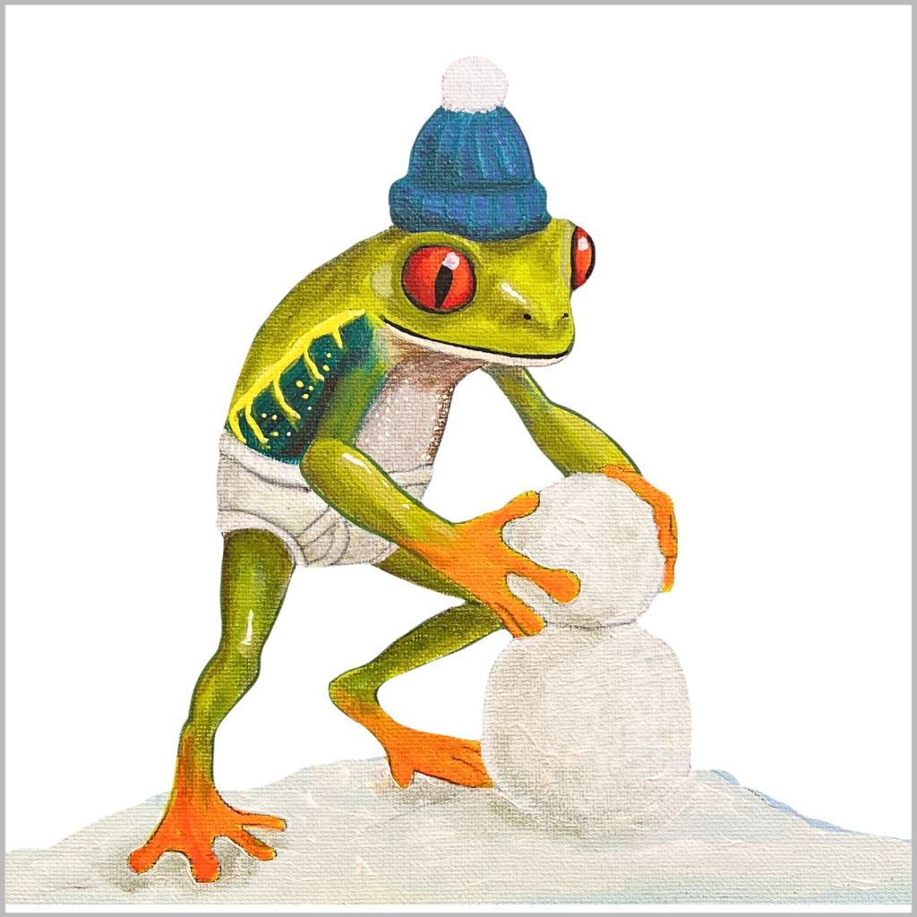 A cartoon frog wearing a blue winter hat and a diaper is building a snowman in a snowy landscape.
